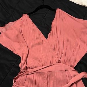 Express jumpsuit in coral pink color